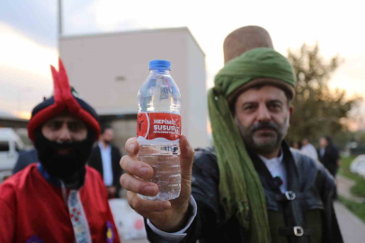 Gürsu’da Başkan Işık Evliya Çelebi oldu su dağıttı