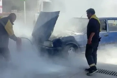 Akaryakıt istasyonunda lastik şişirirken alev alan araca çalışanlar müdahale etti
