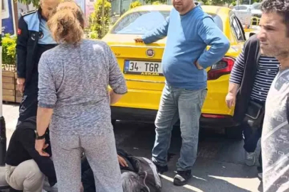 Şişli’de geri geri giden taksi, yaşlı kadını altına aldı
