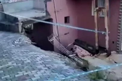 Çöken istinat duvarı binada hasar oluşturdu
